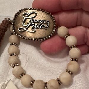 BRAND NEW - AMAZING GRACE Cream Stone Stretch Bracelet w/faux Suede Tassel